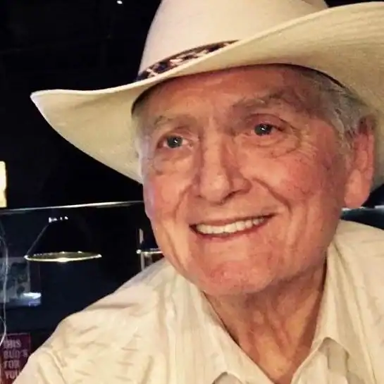 chuck rholfing founder of q bar & grill