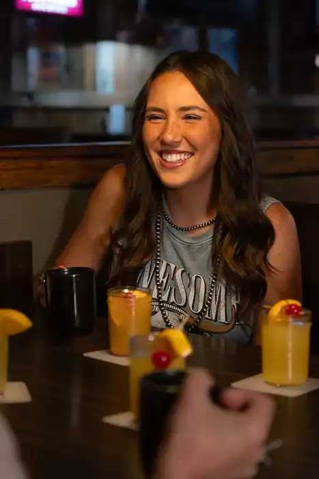 Q Bar and Grill sunday breakfast happy smiling woman